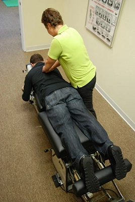 Chiropractor San Francisco CA Amie Gregory Adjusting Mans Back